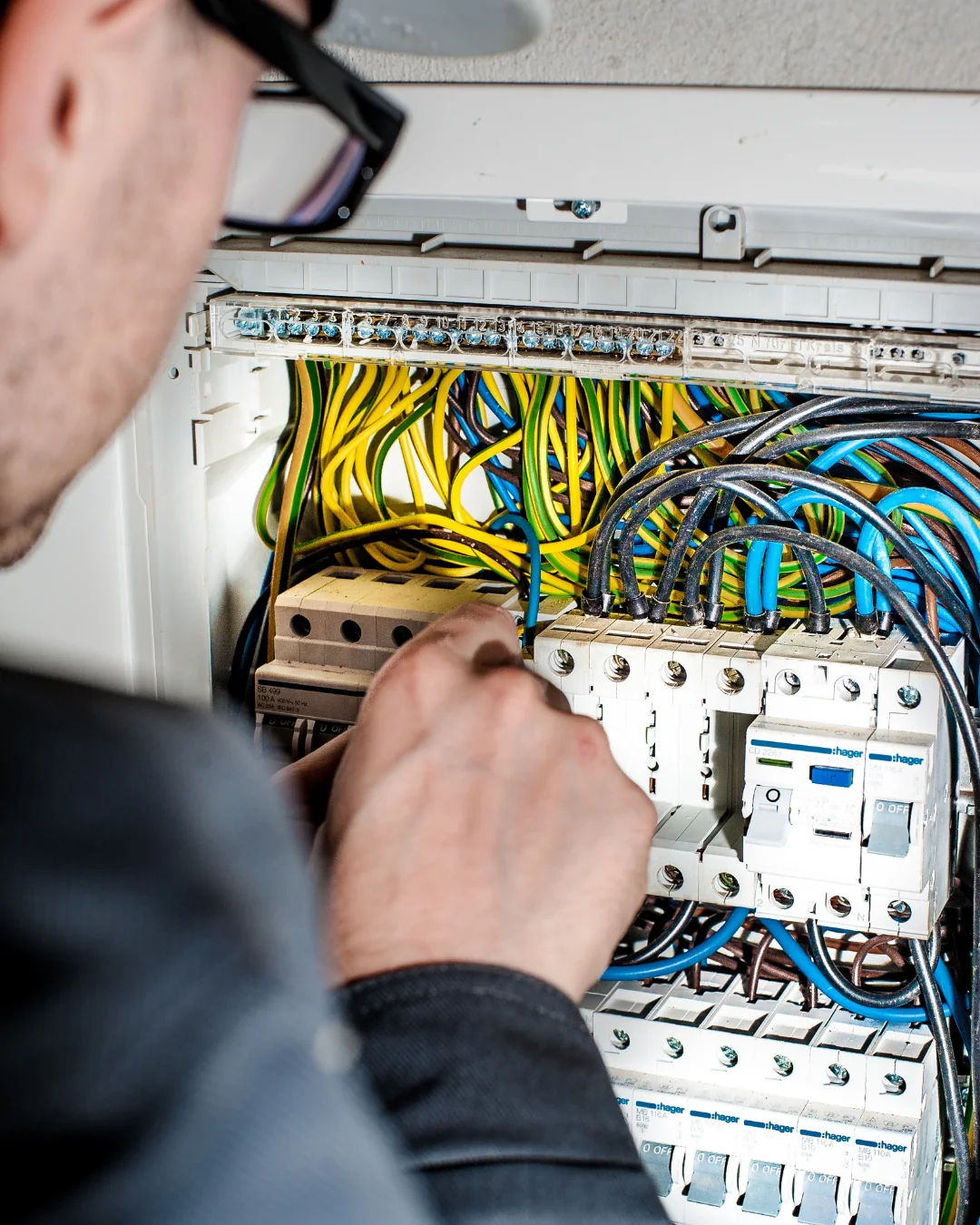 Electrician completing practical electrical work